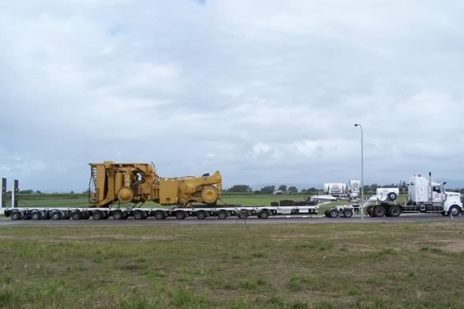 CAT 797B chassis weighs 160 tonnes, transported in Queensland, Australia.