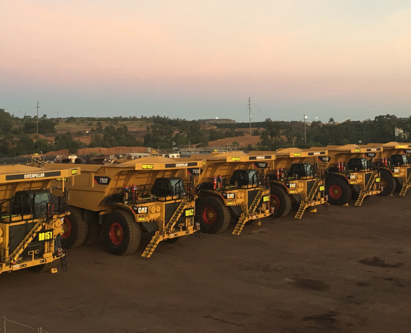 Cat 793F fleet in Queensland Australia - overseas recruitment of Cat trained heavy equipment mechanics is a sound investment.