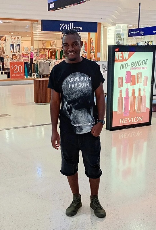 Reuben From Zambia to Australia - spray painter - Skilled Migration Group Limited in Australian Shopping Centre